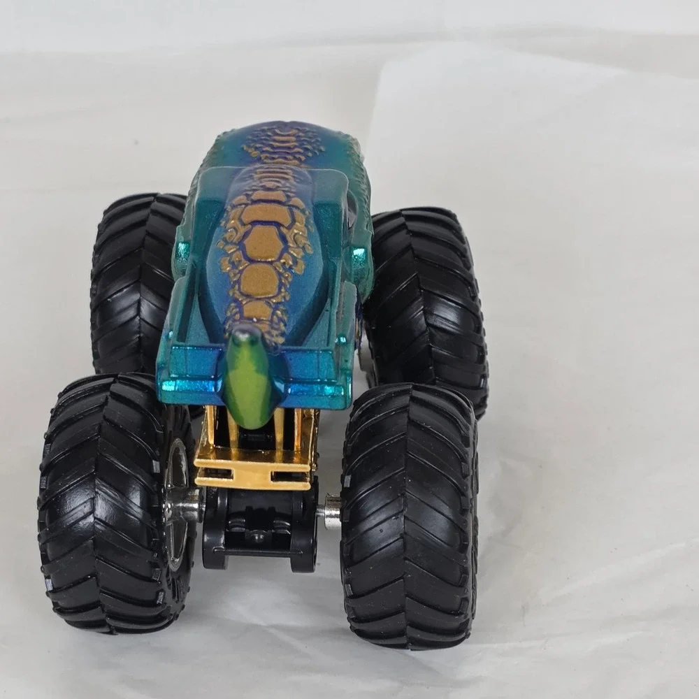Hot Wheels Monster Trucks Mega Wrex Iridescent Teal Blue Gold Chrome 1:64 Scale